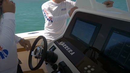 Carrera 32 Center Console Wide Open at Haulover Inlet